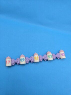 1989 Vintage Tyco The Quints Special For 5 Baby Bottles Connected w/Purple Bows